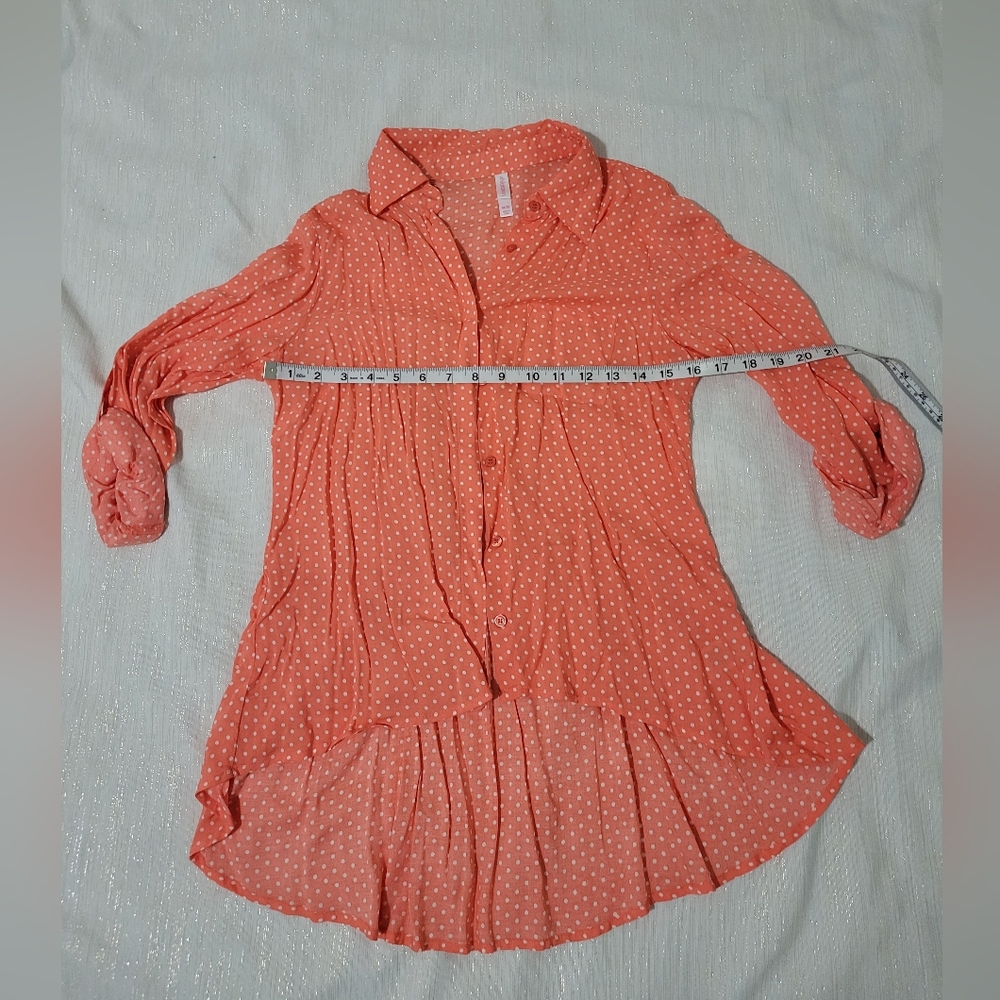 Orange, polka-dot high-low blouse